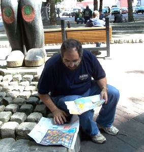 A guy and two maps